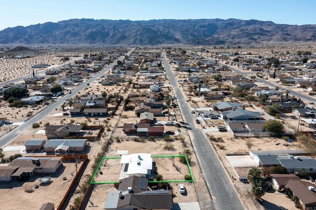 bird's eye view with a mountain view