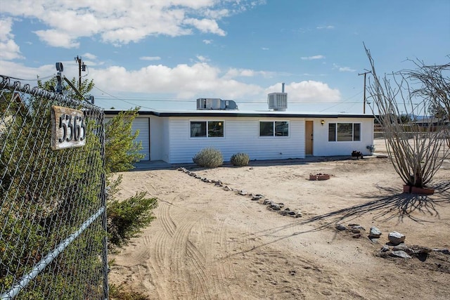 view of front of property featuring cooling unit