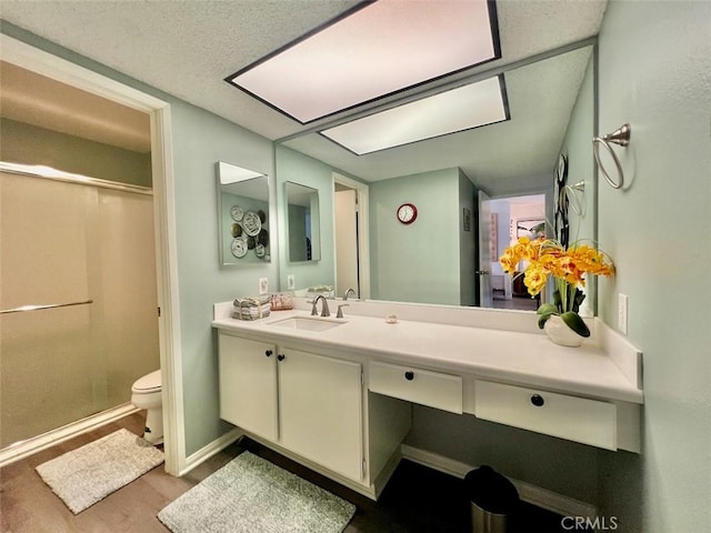 2230 S Palm Canyon Dr Unit 7, Palm Springs, CA 92264 - bathroom with a shower, vanity, and wood finished floors