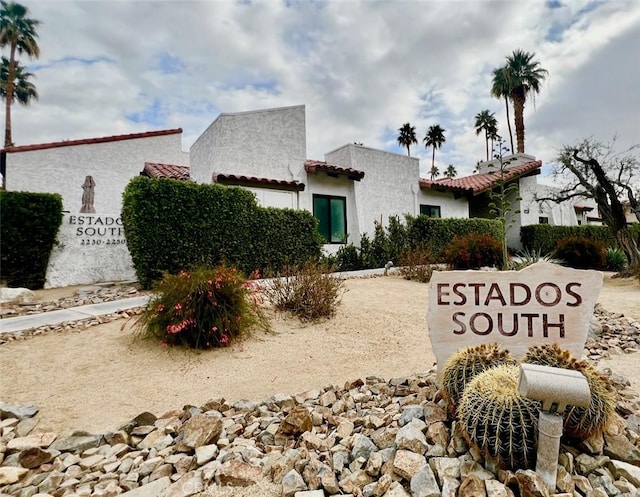 2230 S Palm Canyon Dr Unit 7, Palm Springs, CA 92264 - view of front facade with a tiled roof and stucco siding
