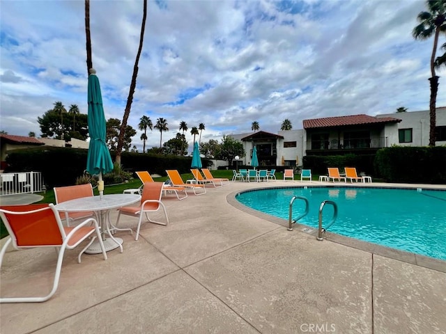2230 S Palm Canyon Dr Unit 7, Palm Springs, CA 92264 - community pool featuring a patio