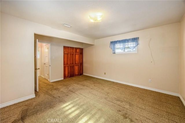 unfurnished bedroom featuring carpet floors