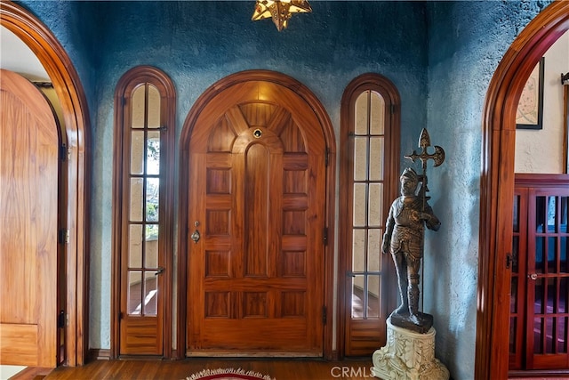 entrance foyer with hardwood / wood-style floors