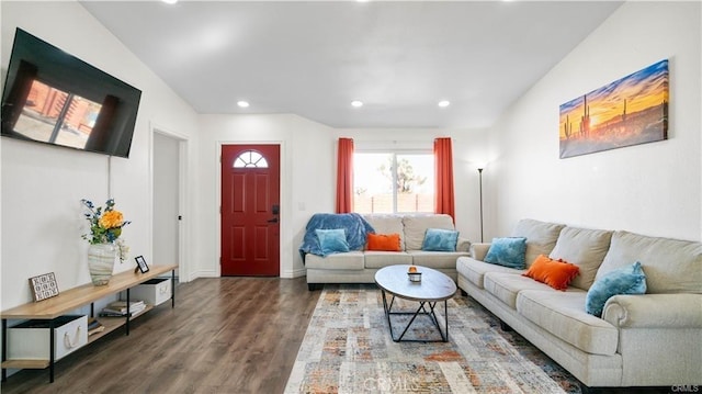 living area featuring wood finished floors and recessed lighting