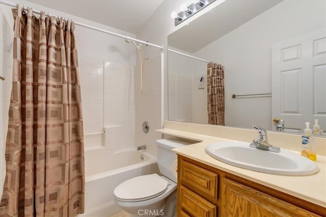 full bath featuring toilet, shower / tub combo with curtain, and vanity