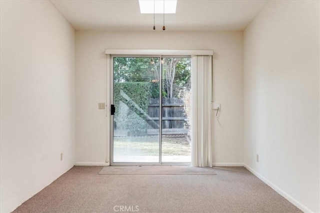 doorway to outside featuring light colored carpet