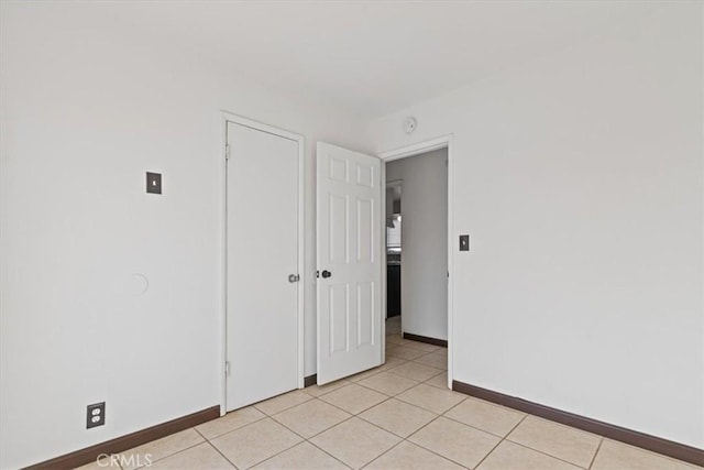 view of tiled spare room