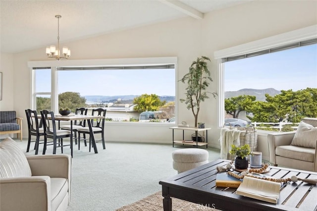 1141 Green Oaks Dr, Los Osos, CA 93402 - carpeted living room featuring a chandelier and a mountain view