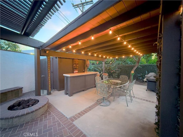 view of patio / terrace featuring a fire pit, fence, a grill, a pergola, and outdoor dining space