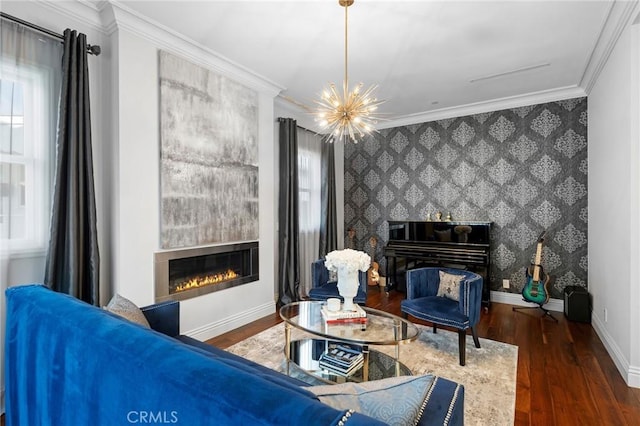 sitting room featuring dark hardwood / wood-style floors, a large fireplace, and ornamental molding