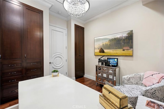 bedroom featuring a notable chandelier, crown molding, and dark hardwood / wood-style floors