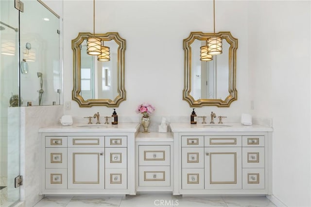 bathroom with vanity and a shower with door