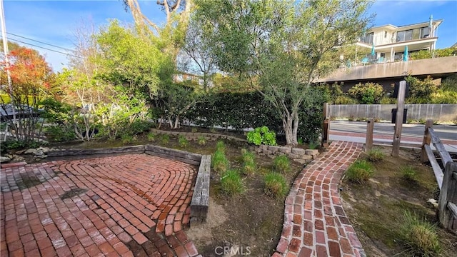 view of community with a patio