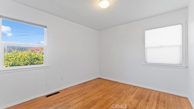 empty room featuring light hardwood / wood-style floors