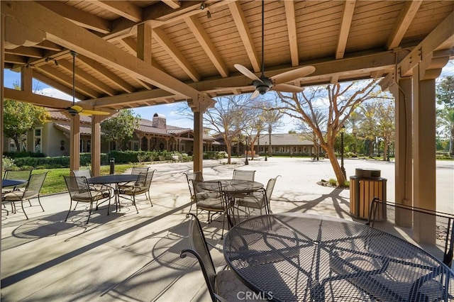 view of patio / terrace featuring outdoor dining area and a ceiling fan