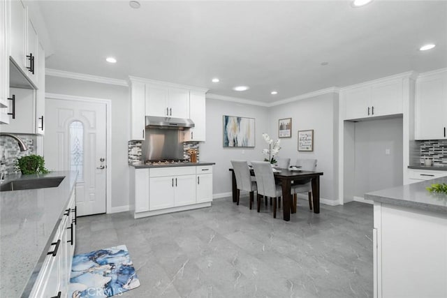 kitchen with sink, white cabinets, and stainless steel gas cooktop