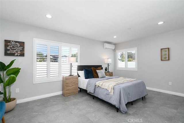 bedroom featuring a wall mounted AC