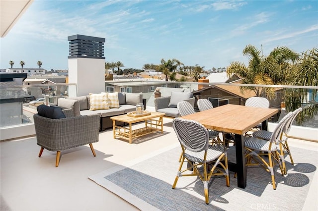 view of patio with an outdoor hangout area and a balcony