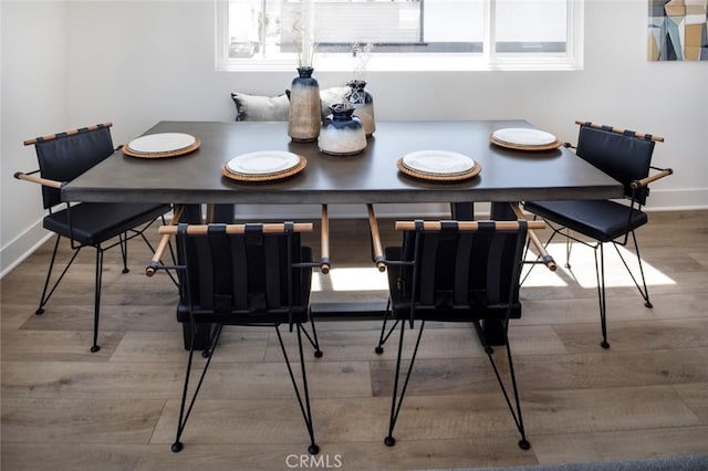 dining room featuring wood-type flooring