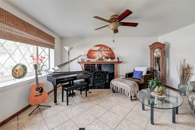 3067 Trinity Dr, Costa Mesa, CA 92626 - sitting room featuring baseboards, a ceiling fan, and tile patterned floors