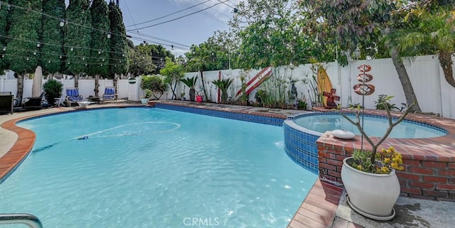 3067 Trinity Dr, Costa Mesa, CA 92626 - view of pool featuring a fenced backyard and a pool with connected hot tub