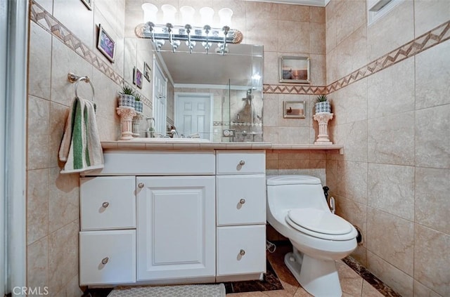 3067 Trinity Dr, Costa Mesa, CA 92626 - full bathroom featuring toilet, crown molding, vanity, and tile walls