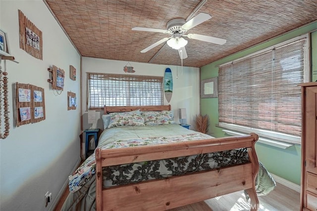 3067 Trinity Dr, Costa Mesa, CA 92626 - bedroom featuring wood finished floors, a ceiling fan, and baseboards