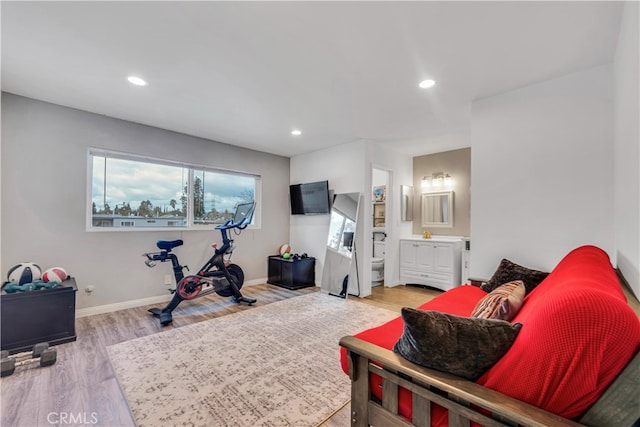 workout room with light wood-type flooring