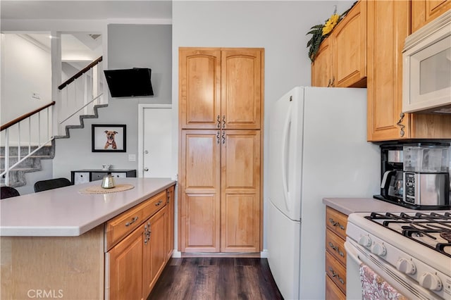 kitchen featuring white appliances, dark wood-type flooring, and light brown cabinets