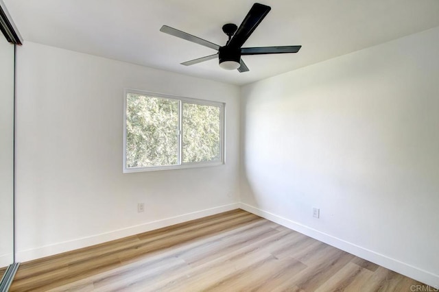 unfurnished room with ceiling fan and light hardwood / wood-style floors