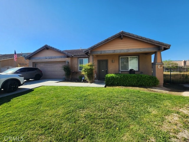 single story home featuring a garage and a front yard