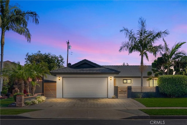 view of front of property with a garage