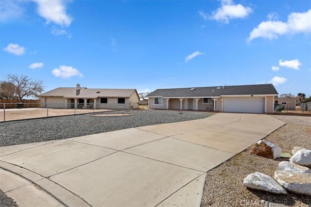 ranch-style house featuring a garage