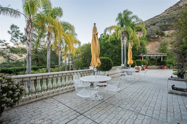 27 Round Up Rd, Bell Canyon, CA 91307 - view of patio / terrace featuring outdoor dining area and a mountain view