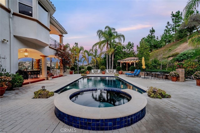 27 Round Up Rd, Bell Canyon, CA 91307 - view of pool with a patio, a pool with connected hot tub, and fence