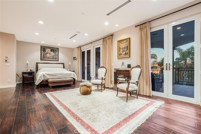 27 Round Up Rd, Bell Canyon, CA 91307 - bedroom featuring french doors, dark wood-type flooring, access to outside, recessed lighting, and baseboards