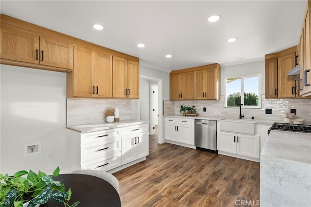 kitchen with backsplash, recessed lighting, a sink, and dishwasher