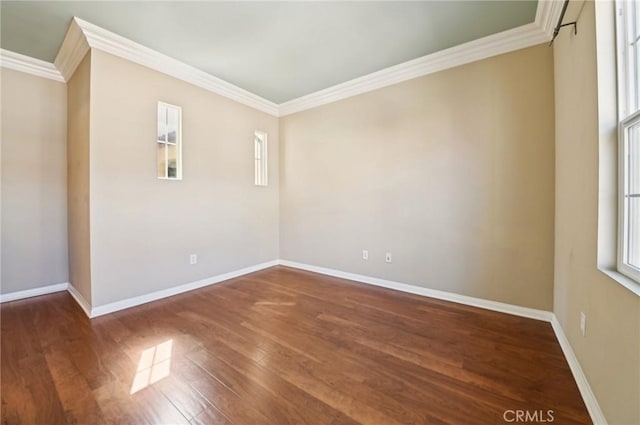 33 Perennial, Irvine, CA 92603 - unfurnished room with crown molding, wood finished floors, and baseboards