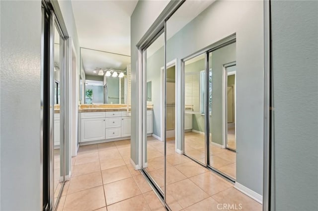 33 Perennial, Irvine, CA 92603 - hallway with light tile patterned floors and baseboards