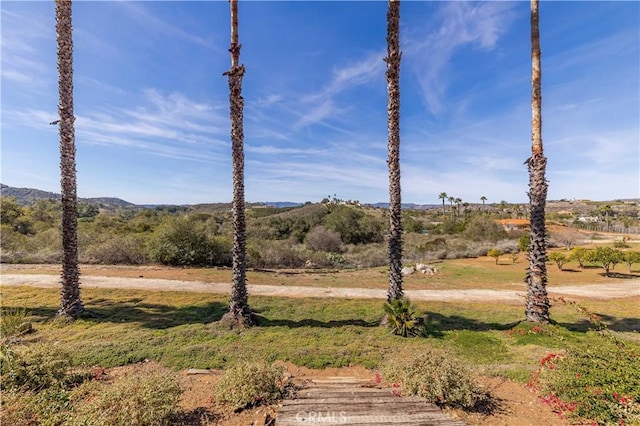 property view of mountains featuring a rural view