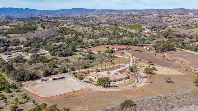 drone / aerial view featuring a mountain view