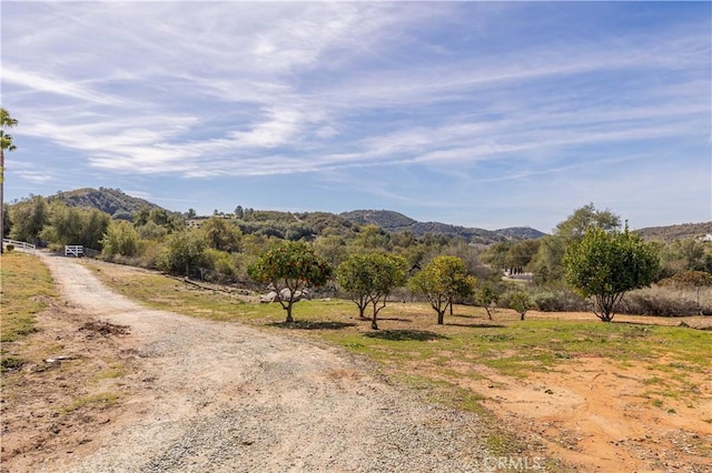 property view of mountains featuring a rural view