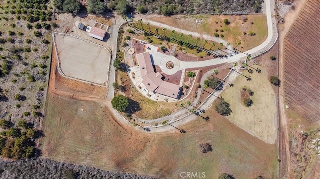 birds eye view of property featuring a rural view