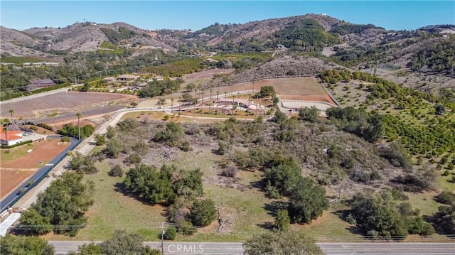 drone / aerial view featuring a mountain view