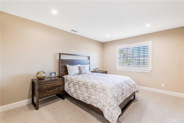 bedroom with light carpet, baseboards, visible vents, and recessed lighting