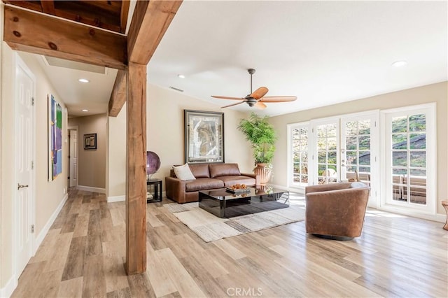 living room with recessed lighting, a ceiling fan, baseboards, vaulted ceiling, and light wood-style floors