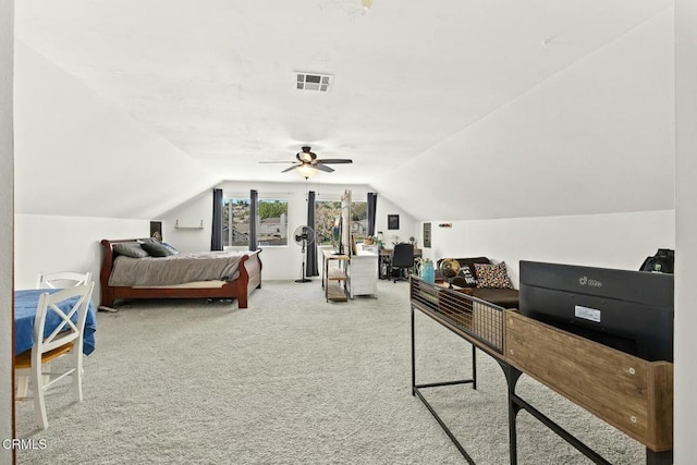 bedroom featuring carpet, lofted ceiling, and ceiling fan