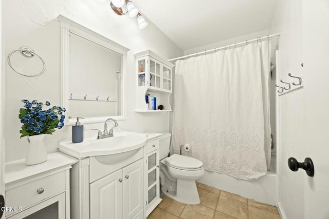 full bathroom with shower / tub combo, vanity, and toilet