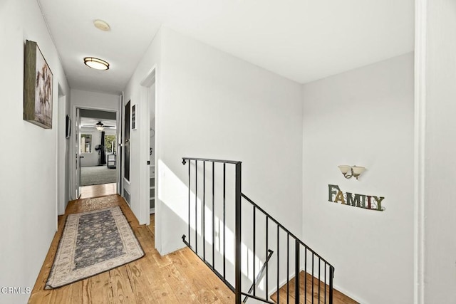 16606 Shinedale Dr, Canyon Country, CA 91387 - hallway featuring an upstairs landing and light wood-style floors