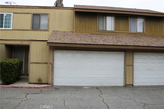 garage with driveway